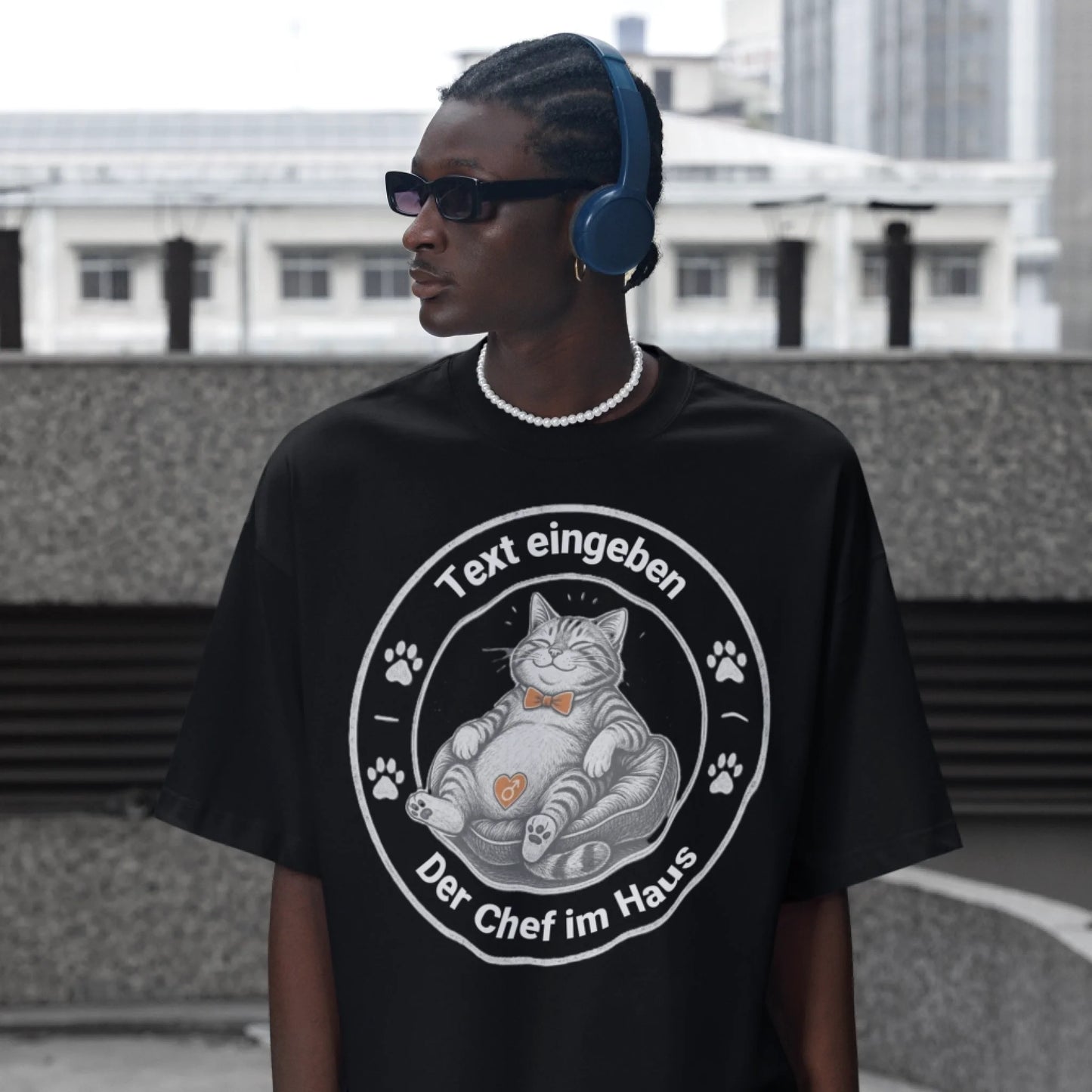 oversized-t-shirt-mockup-featuring-a-man-with-headphones-standing-by-the-street-m55874